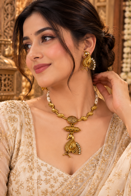 MAYURAKSHI GOLD-TONE PEACOCK MOTIF NECKLACE SET WITH EARRINGS